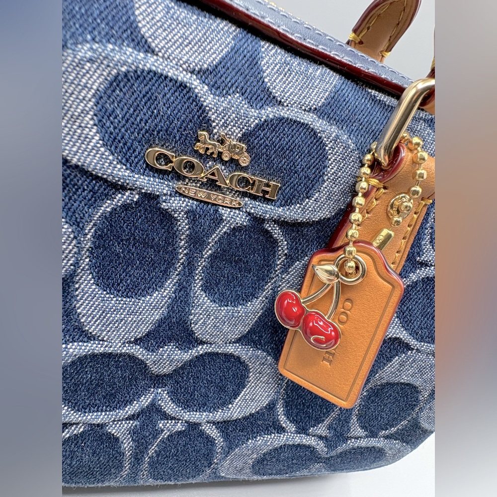 **SOLD**Coach Denim Mini Rowan